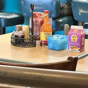 a man sitting at a table in a diner