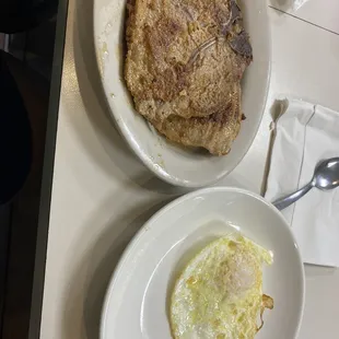 Grilled pork chops and egg.