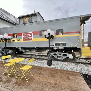 Inside the train is a little play area for kids