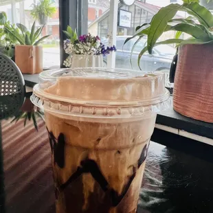 a cup of coffee on a table