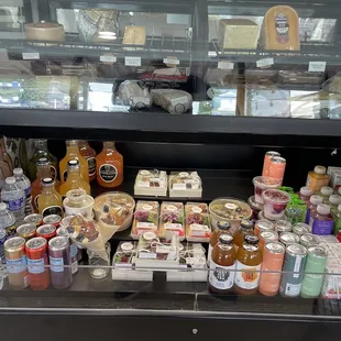 Charcuterie boxes, cheeses and bottled drinks for sale