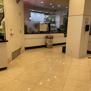 a tiled floor in a hotel lobby
