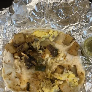 Inside of the mushroom breakfast taco. Around $6.
