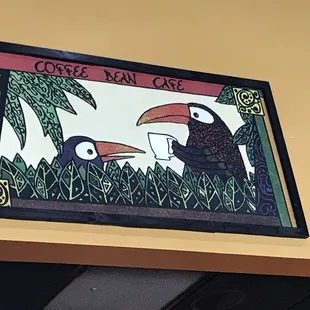 two toucans and a toucan