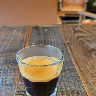 a shot of coffee on a table