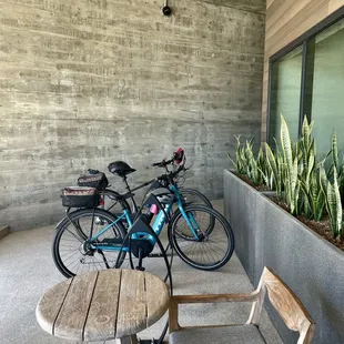 We parked our eBikes at the bike rack in the shade of the building.