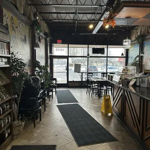 This is the entrance way. There are nice murals and coffee related stuff on the walls!