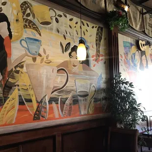 a painting of a woman and a cow