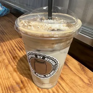 Seasonal coconut coffee with lechera and extra coconut flakes on top, really good!