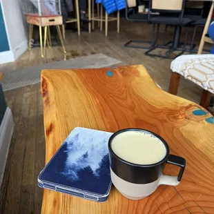 Hot chai in booth seating near the front