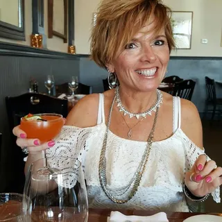 Gina J.