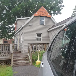 a car parked in front of a house