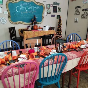 Set table (we provided the table runner, candles)