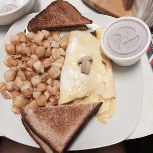 Denver Omelette with American fries and wheat toast.