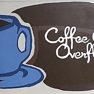 a coffee cup overflowing