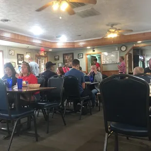 a group of people sitting at a table