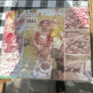a newspaper with a picture of a man and a woman