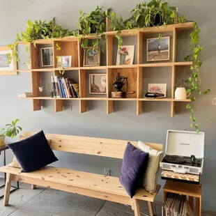 a wooden bench in a coffee shop