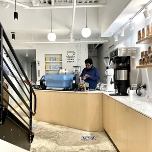 a bari serving a cup of coffee
