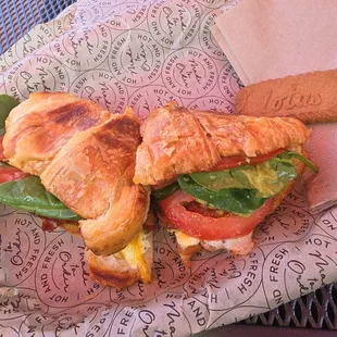 Make your own: Croissant, bacon, egg, spinach, tomatoes, guacamole, cheddar