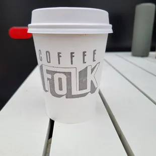 a cup of coffee on a table