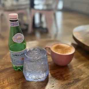 Sparkling water in cute glass! And wonderfully warm salep