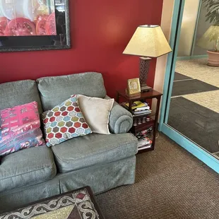 a living room with red walls