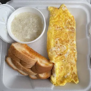 Cheese Omelette with white toast and grits