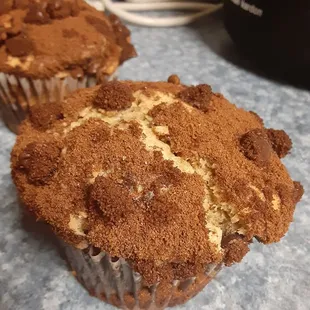two muffins on a counter