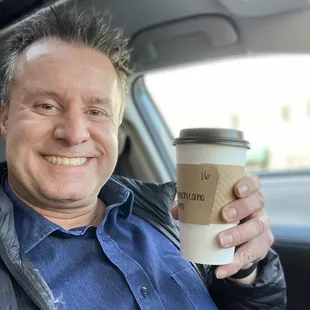 Me with a goofy grin about to enjoy my coffee!!