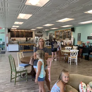 a group of people in a coffee shop