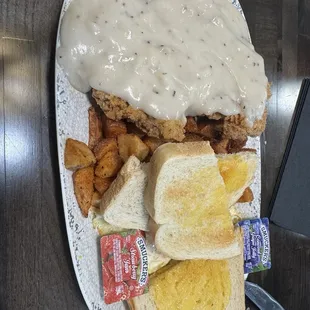 Chicken fried steak and eggs with seasoned potatoes. So good!!!