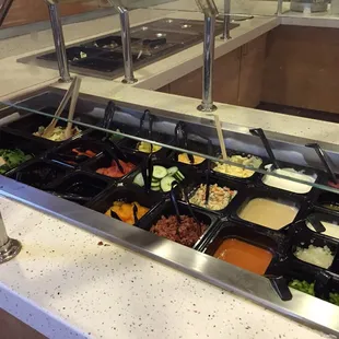 a buffet with a variety of food items