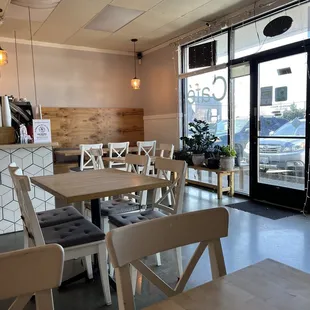 tables and chairs in a coffee shop