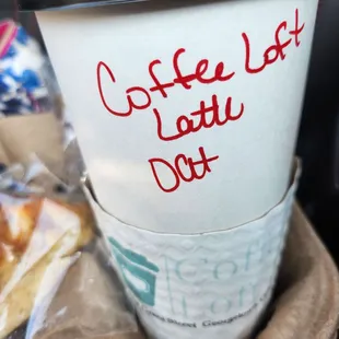 a cup of coffee and some pastries