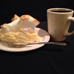 a piece of pie and a cup of coffee