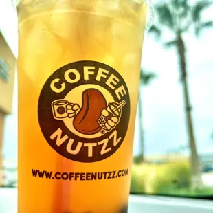 Black mango tea with Boba.