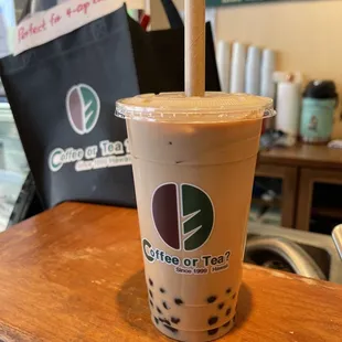 a plastic cup with a straw