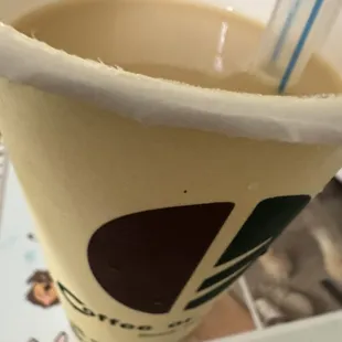 Green tea milk tea no sugar no ice, pudding on bottom for fur Bebe