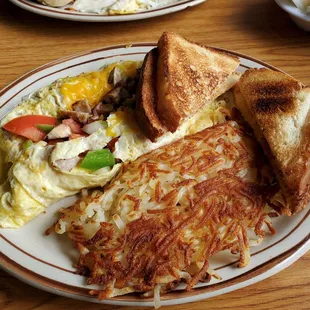 Everything omelette,  English toast,  hashbrowns