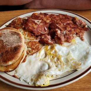Corned beef, English muffin,  hashbrowns,  eggs.