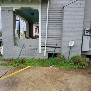 These front couple of parking spots in this lot are for Coffee Science. The rest are marked for Addis (middle) or unmarked (back).