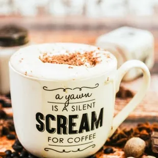 A Yawn is a Silent SCREAM for Coffee of course....