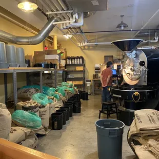 a man working in a coffee shop