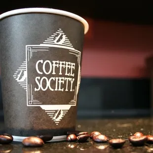 a cup of coffee on a table