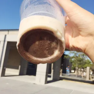 Bunch of drink power stuff in the bottom of the chai tea latte. Still downed most of it since I needed the caffeine.