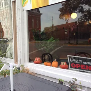 a view of the outside of a coffee shop