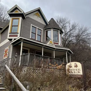 the front of a house on a hill