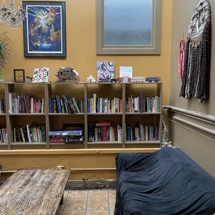 a living room with bookshelves