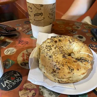 a bagel and a cup of coffee